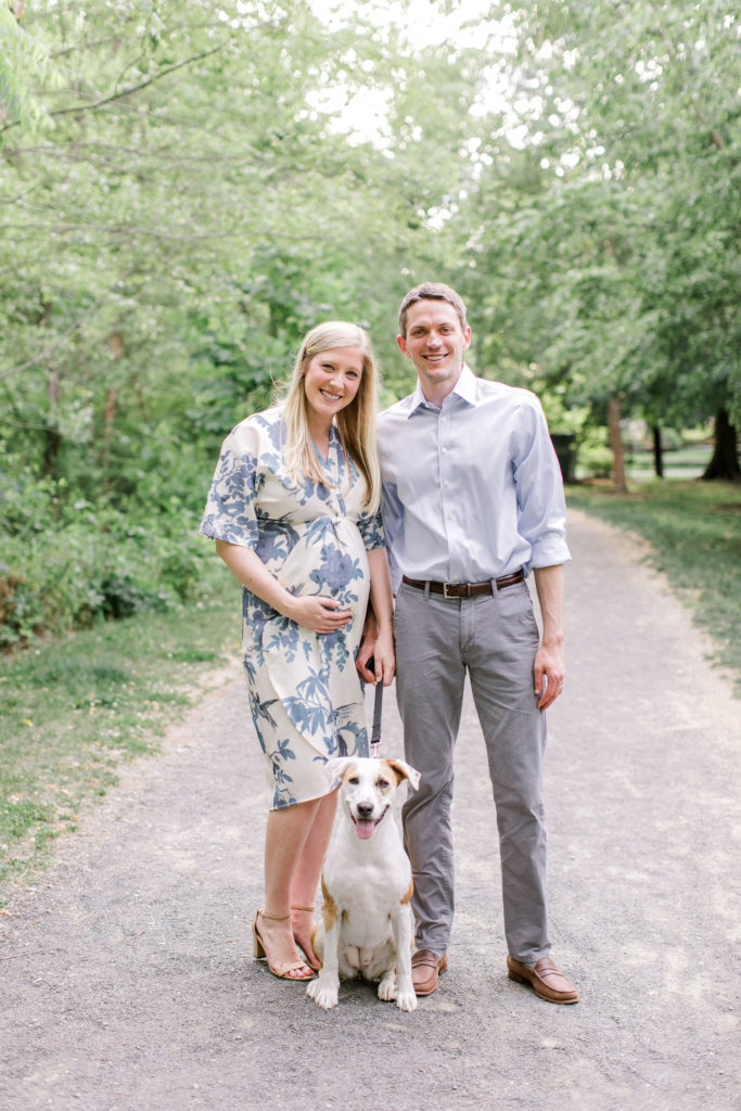 couple expecting baby with dog maternity photography in arlington va