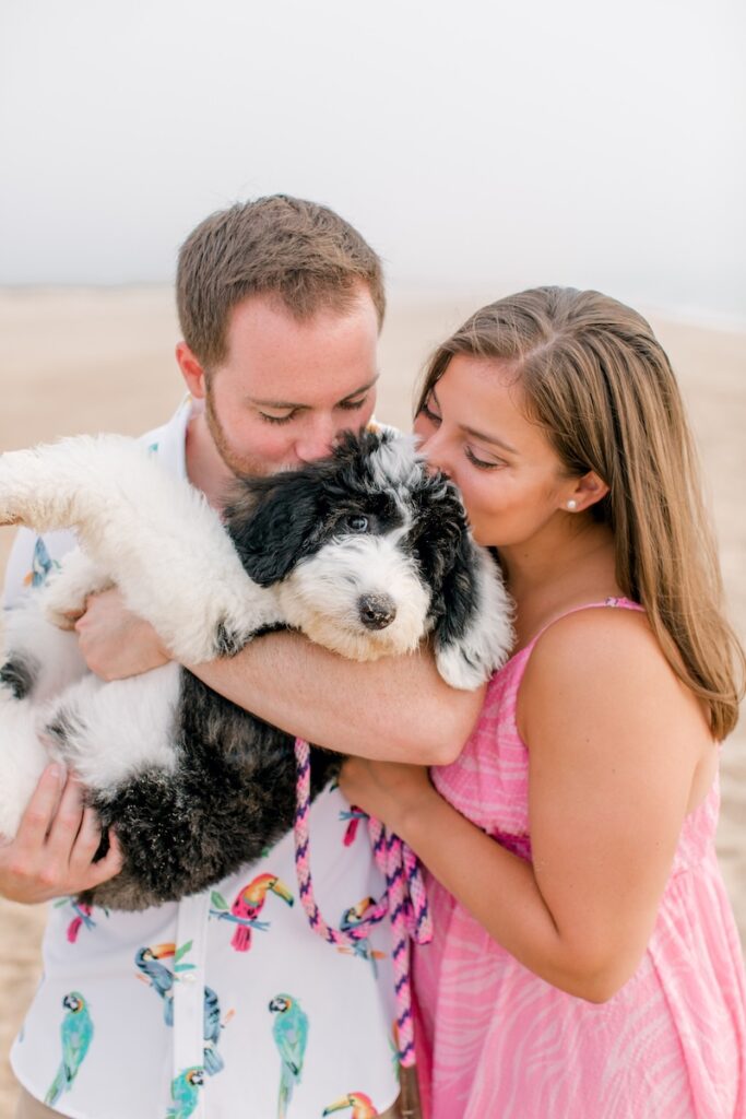 Fenwick Island couples photographer — anniversary portraits with sheepadoodle on Delaware shore