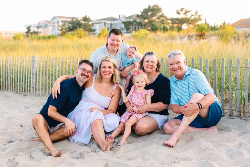 Family beach portrait, capturing joyful moments and vibrant personalities, perfect for beach photography sessions.