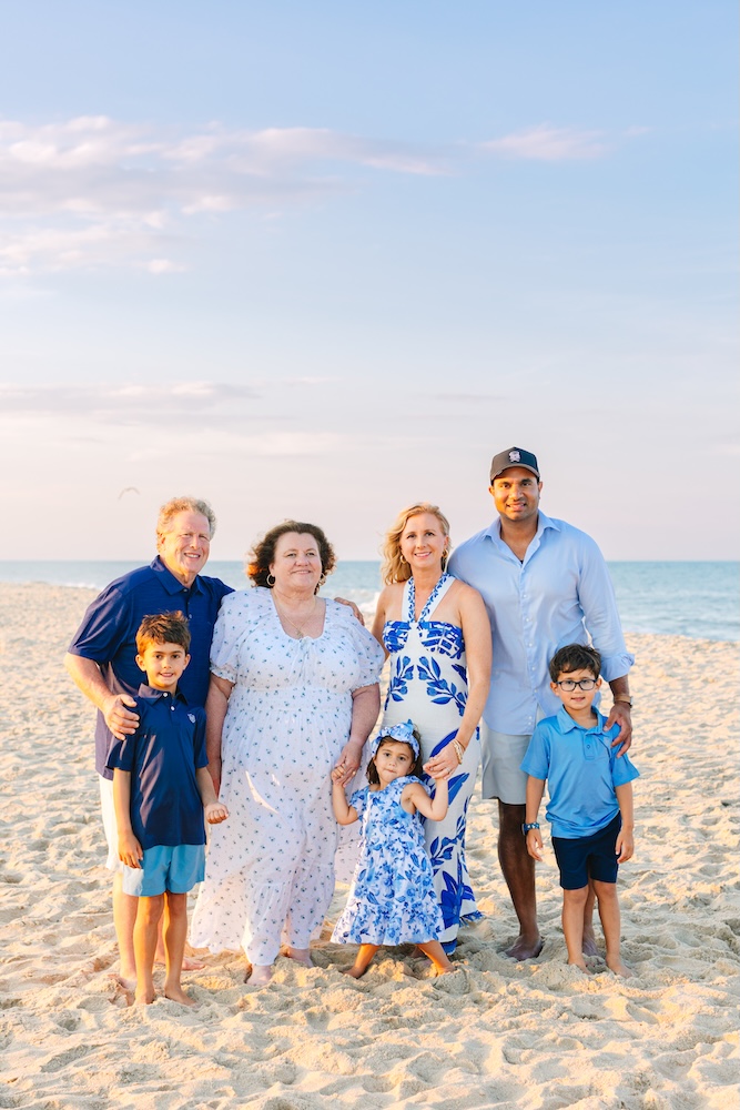 Coordinating family photo outfits at sunset